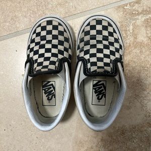 Size 7 toddler checkered slip ons! Have a lot of life left! Great price!